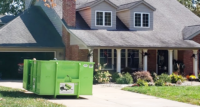 Reasons to Rent a Dumpster in front of house